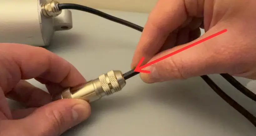 Push the cable into the connector until internal wires are covered